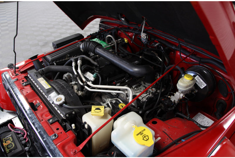 Pre-Owned 2005 RubiTrux Wrangler Conversion Flame Red - SOLD