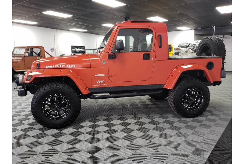 Pre-Owned 2006 Jeep Wrangler Rubicon Unlimited RubiTrux Conversion Orange - SOLD