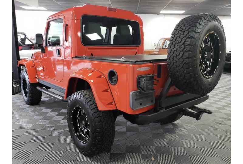 Pre-Owned 2006 Jeep Wrangler Rubicon Unlimited RubiTrux Conversion Orange - SOLD