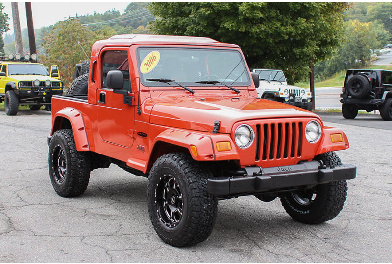 Pre-Owned 2006 Jeep Wrangler Unlimited RubiTrux Conversion Impact Orange - SOLD
