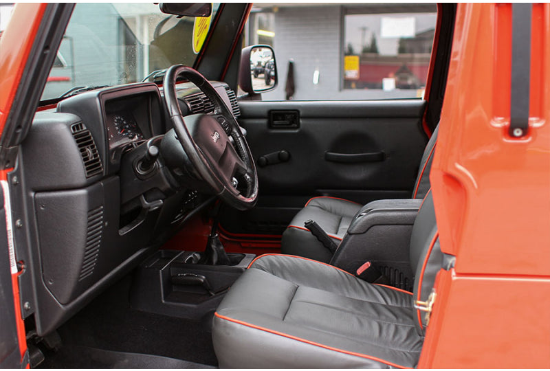 Pre-Owned 2006 Jeep Wrangler Unlimited RubiTrux Conversion Impact Orange - SOLD