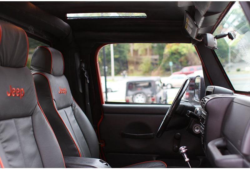 Pre-Owned 2006 Jeep Wrangler Unlimited RubiTrux Conversion Impact Orange - SOLD