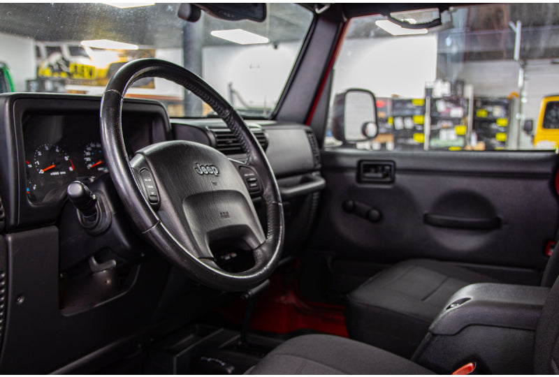 Pre-Owned 2006 Jeep Wrangler Rubicon Unlimited RubiTrux Conversion Red - SOLD