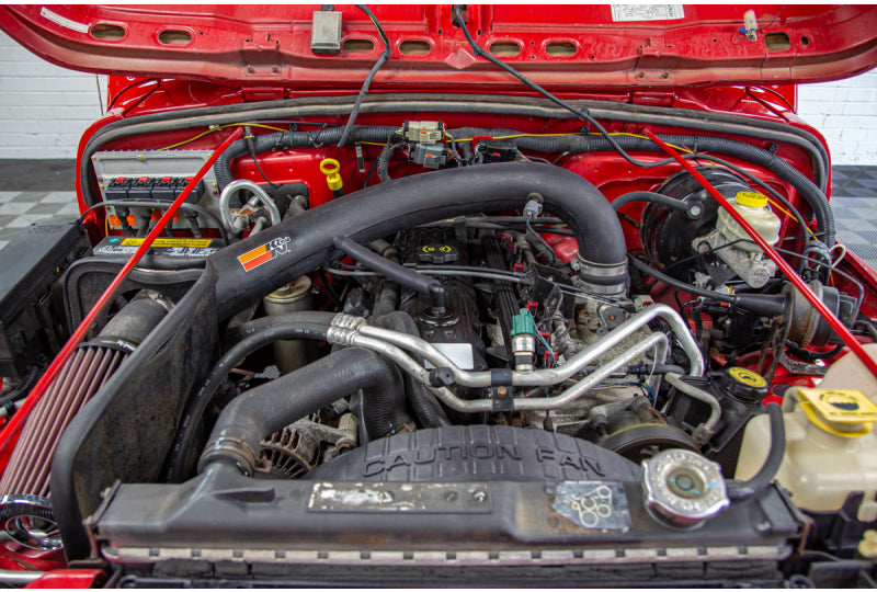 Pre-Owned 2006 Jeep Wrangler Rubicon Unlimited RubiTrux Conversion Red - SOLD