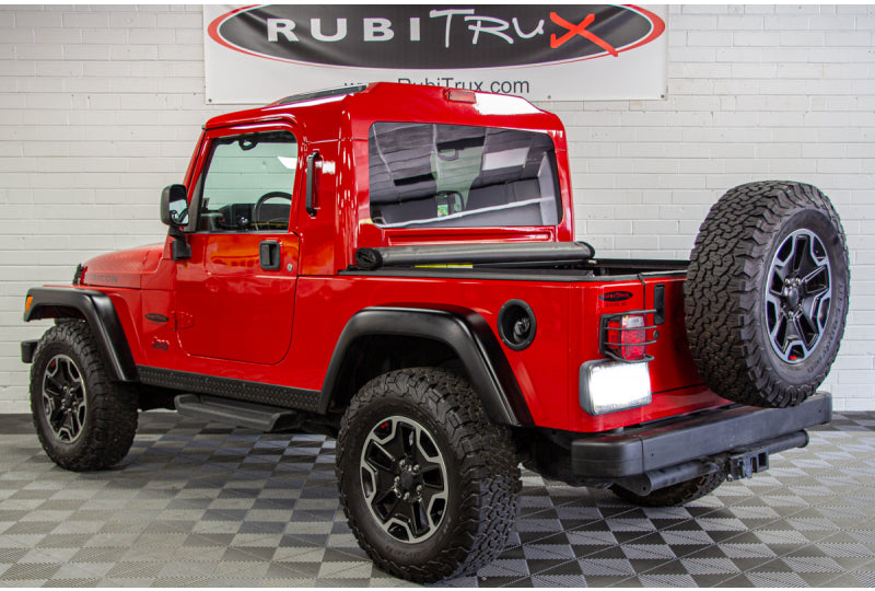 Pre-Owned 2006 Jeep Wrangler Rubicon Unlimited RubiTrux Conversion Red - SOLD