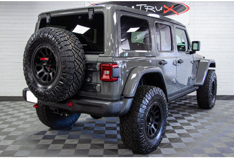 Passenger rear corner shot of this 2020 Jeep Wrangler Unlimited Rubicon JL Hellcat HEMI Sting Gray