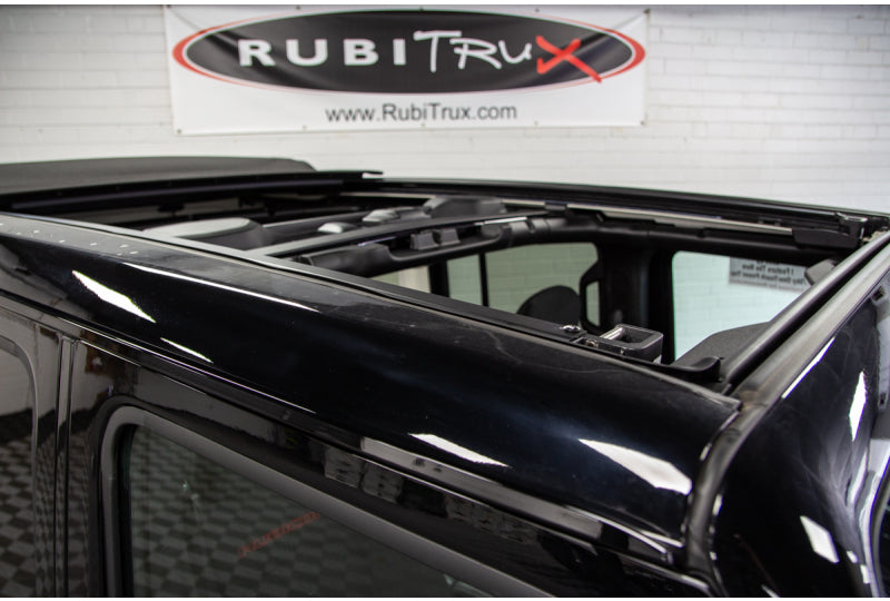 Vehicle shown is black and not hydro blue.