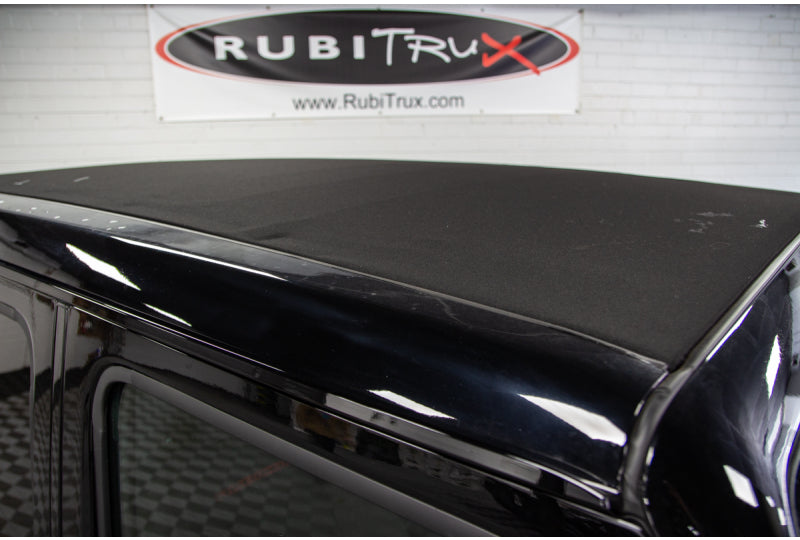 Vehicle shown is black and not hydro blue.