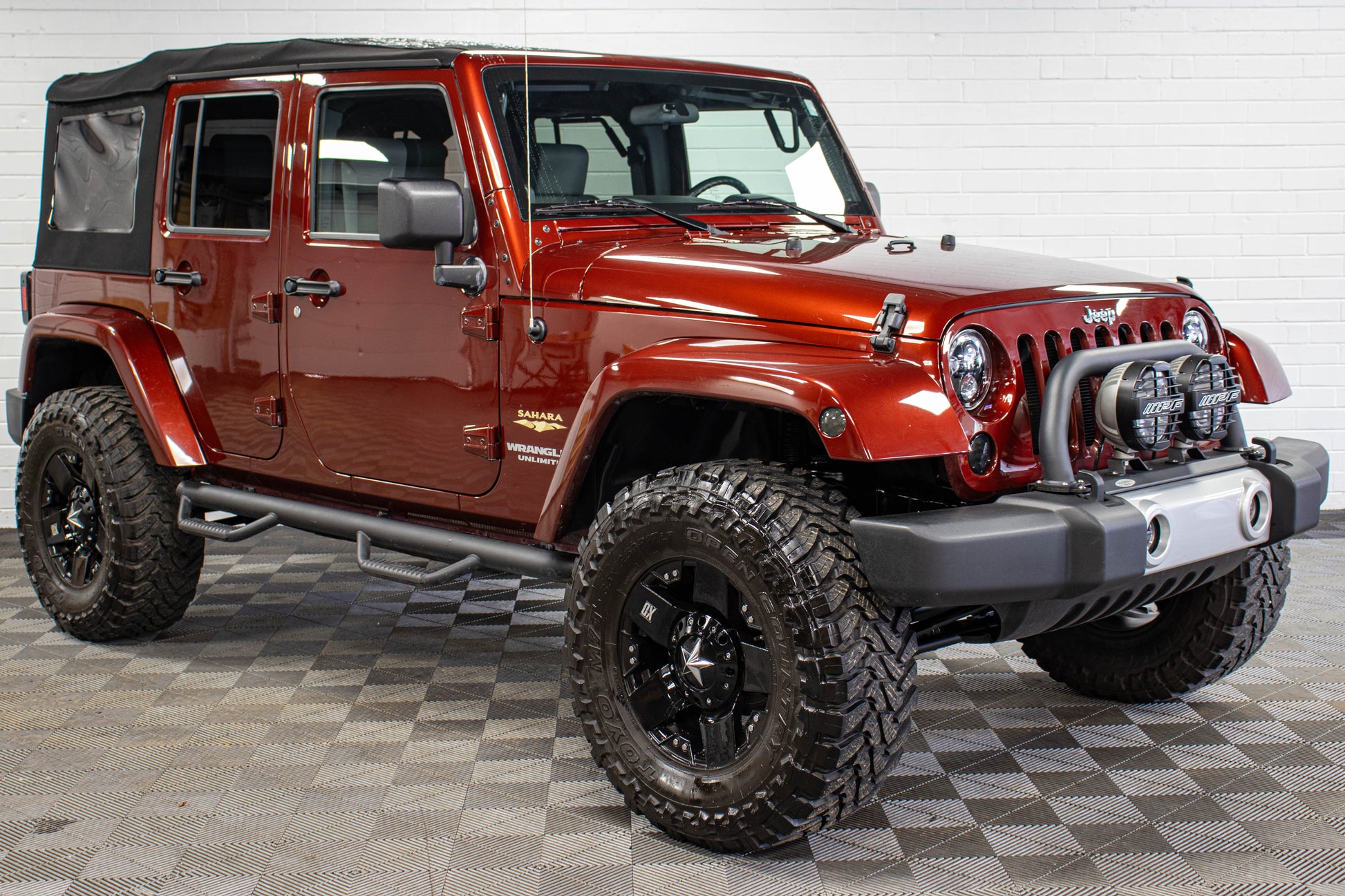 Pre-Owned 2009 Jeep Wrangler Unlimited Sahara Soft Top Red Rock - SOLD