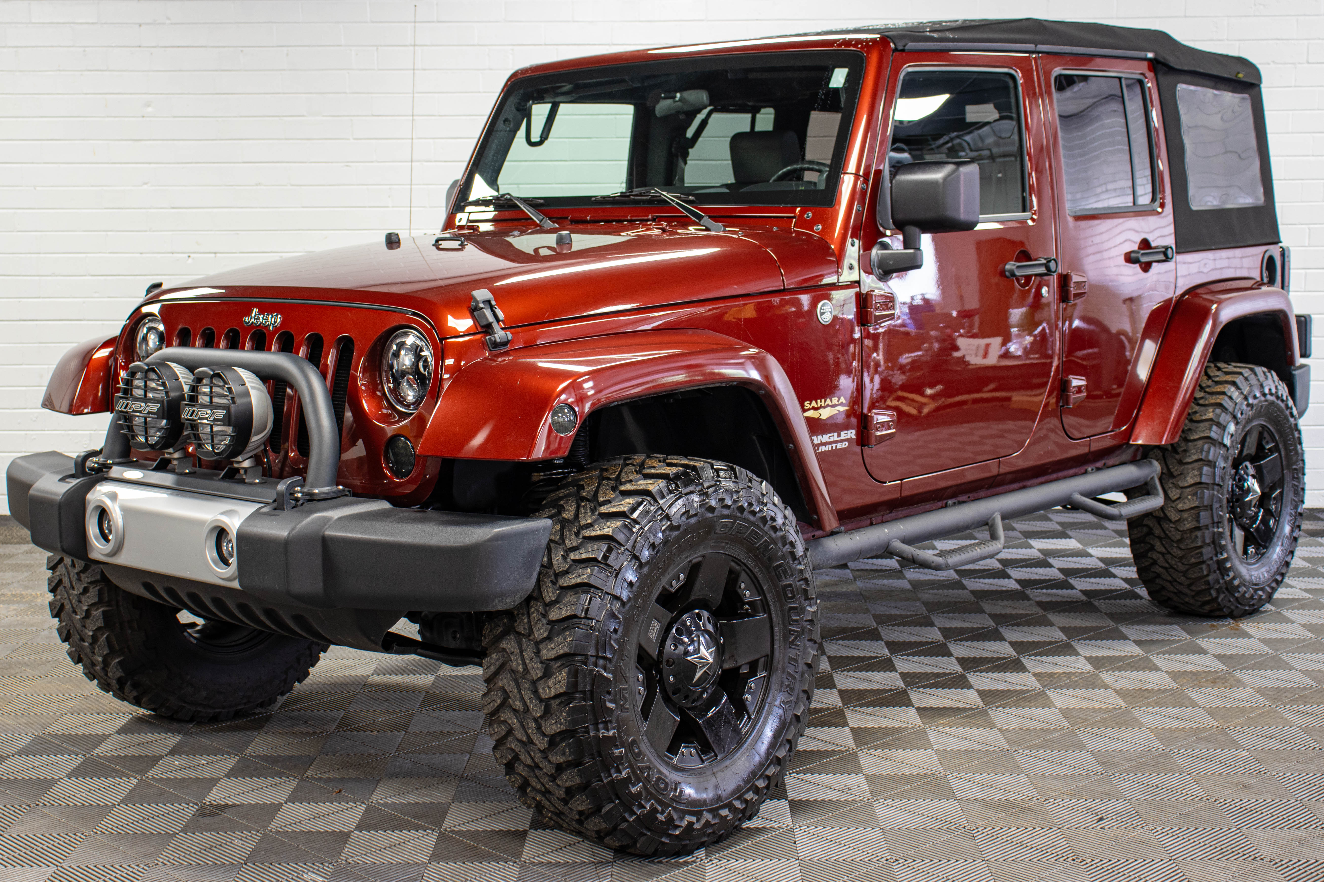 Pre-Owned 2009 Jeep Wrangler Unlimited Sahara Soft Top Red Rock - SOLD