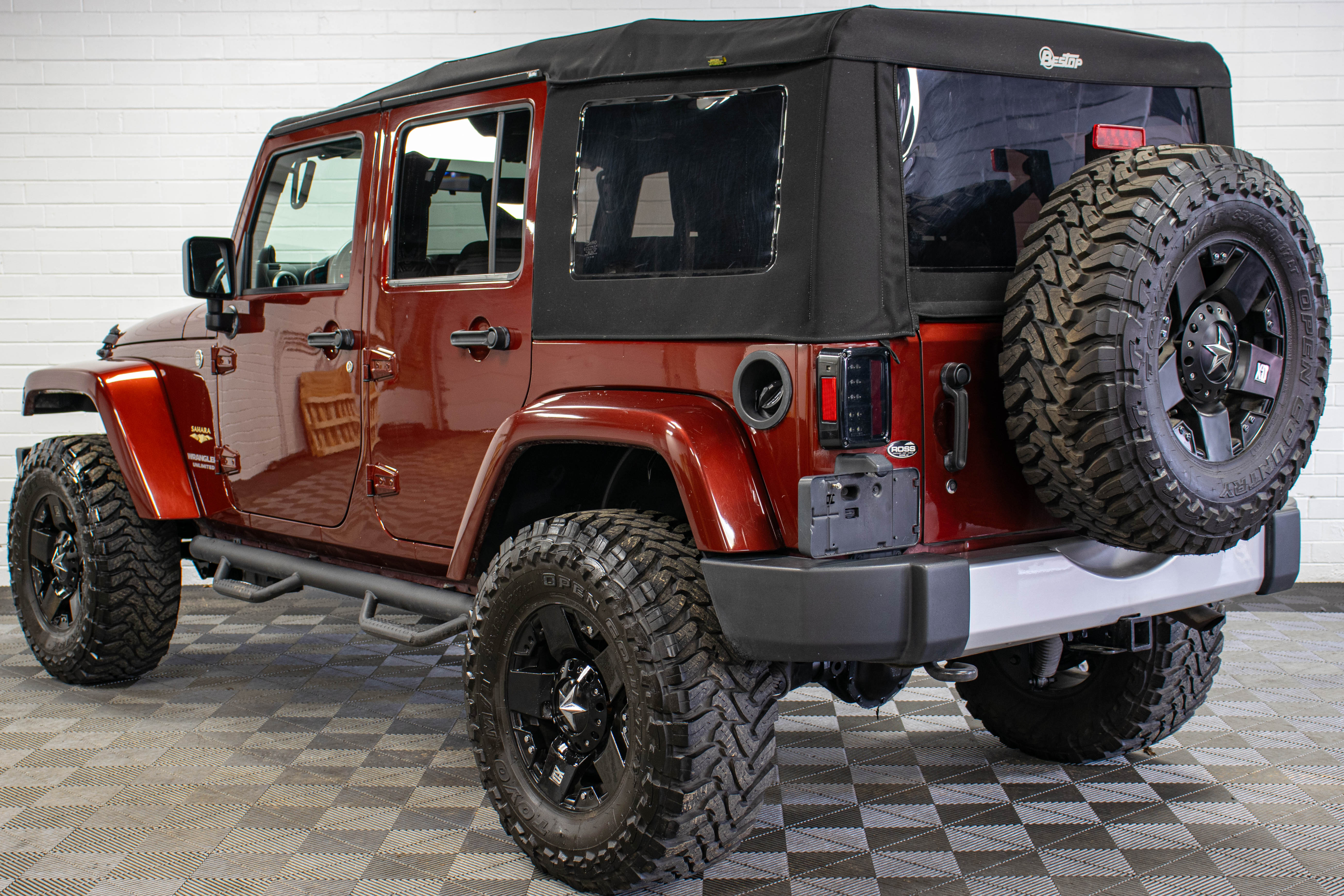 Pre-Owned 2009 Jeep Wrangler Unlimited Sahara Soft Top Red Rock - SOLD