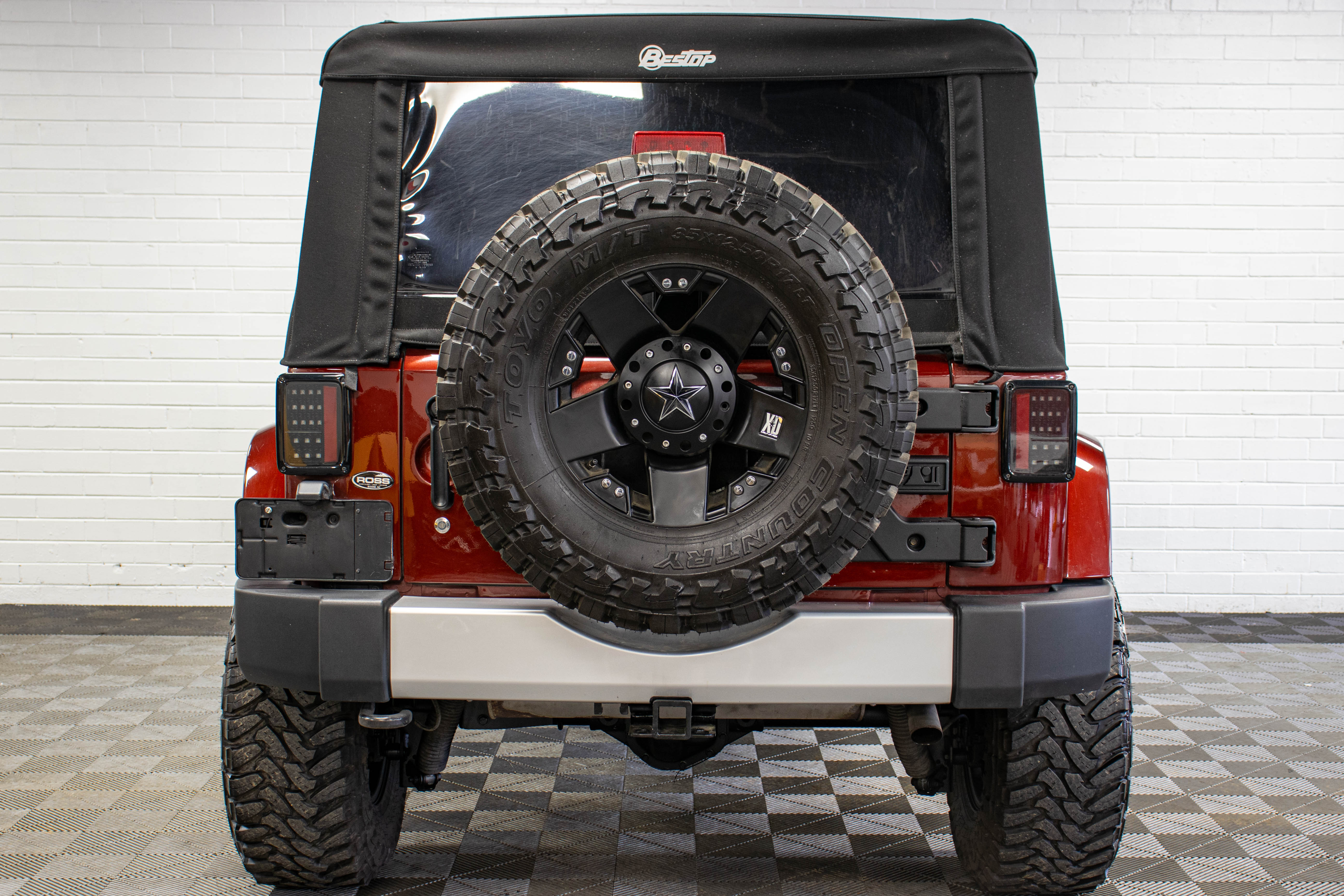 Pre-Owned 2009 Jeep Wrangler Unlimited Sahara Soft Top Red Rock - SOLD