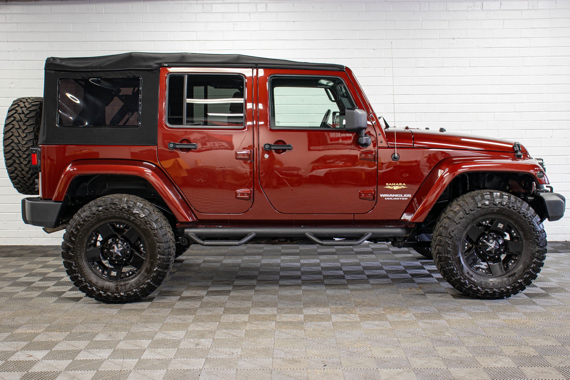 Pre-Owned 2009 Jeep Wrangler Unlimited Sahara Soft Top Red Rock - SOLD