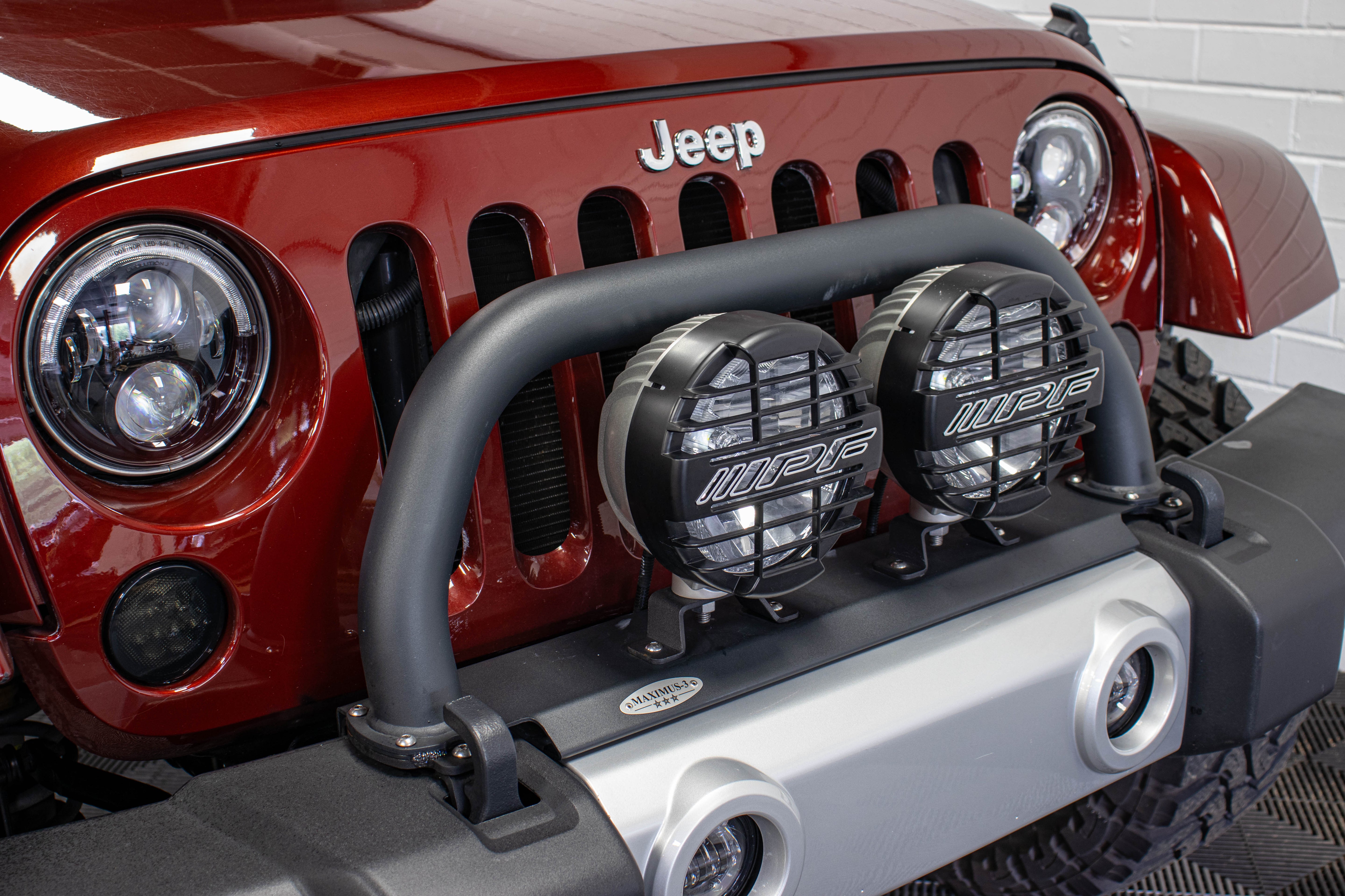 Pre-Owned 2009 Jeep Wrangler Unlimited Sahara Soft Top Red Rock - SOLD