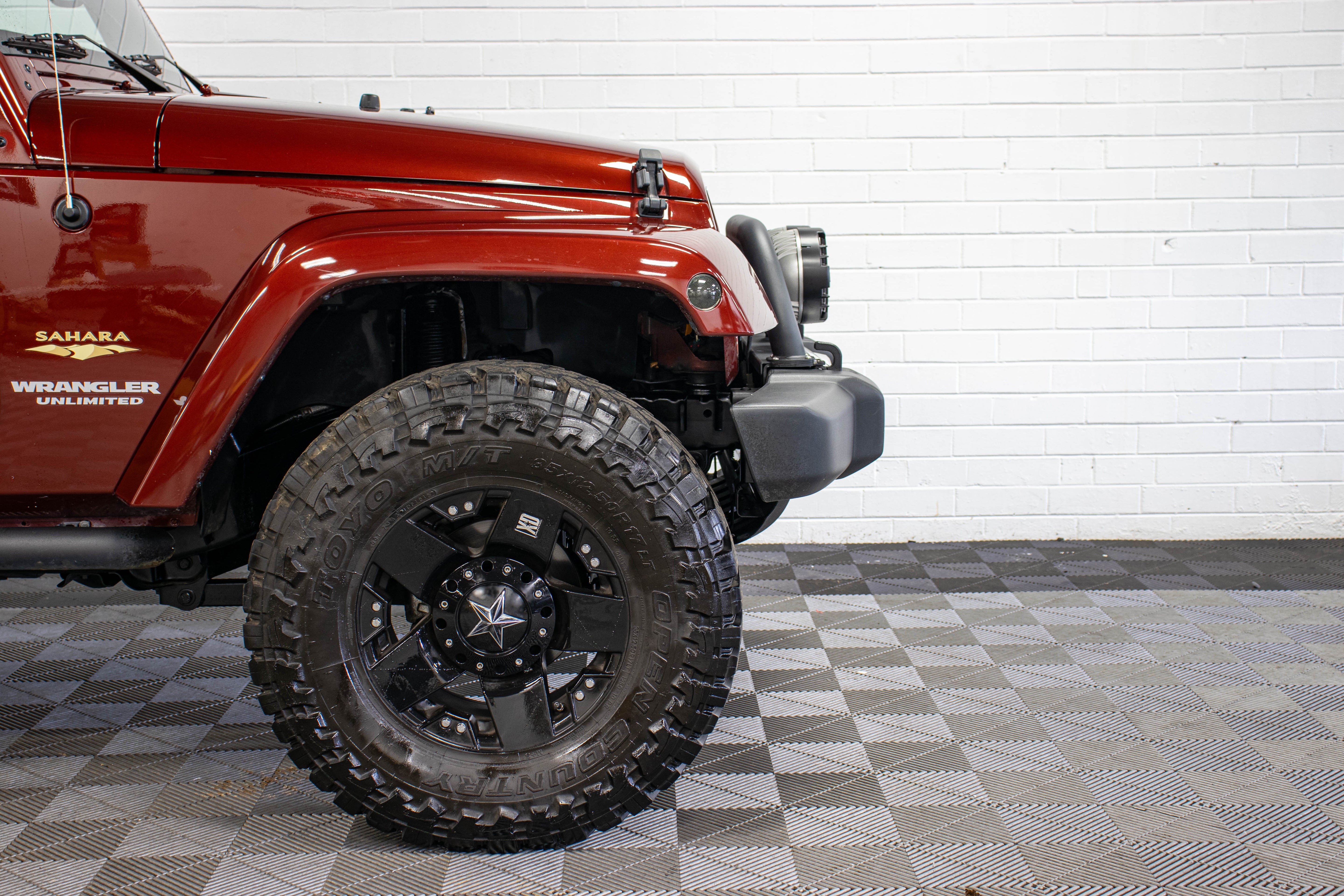 Pre-Owned 2009 Jeep Wrangler Unlimited Sahara Soft Top Red Rock - SOLD