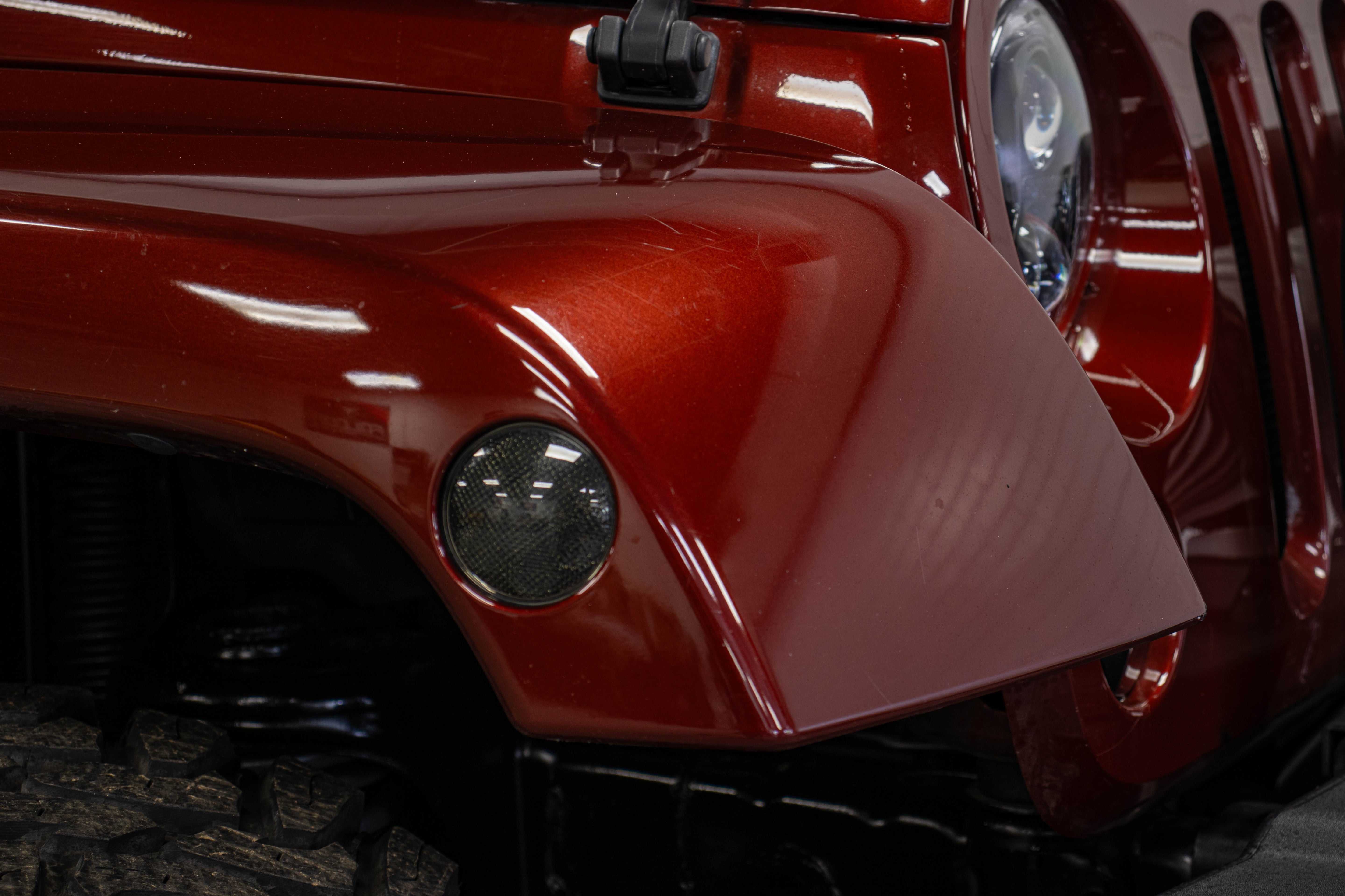 Pre-Owned 2009 Jeep Wrangler Unlimited Sahara Soft Top Red Rock - SOLD