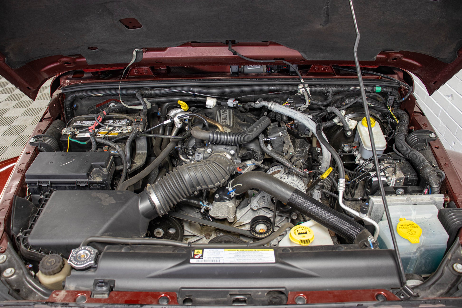 Pre-Owned 2009 Jeep Wrangler Unlimited Sahara Soft Top Red Rock - SOLD