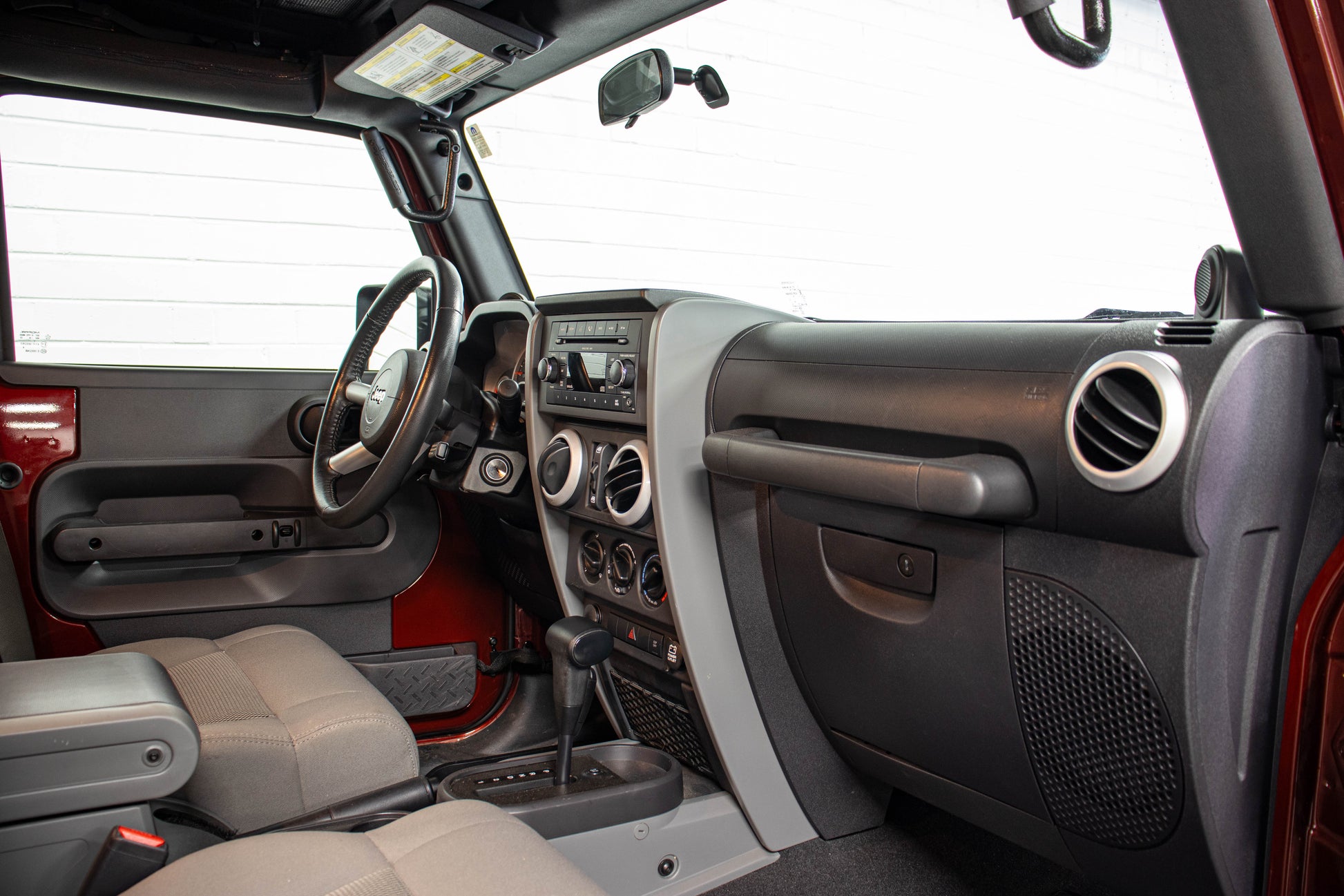 Pre-Owned 2009 Jeep Wrangler Unlimited Sahara Soft Top Red Rock - SOLD