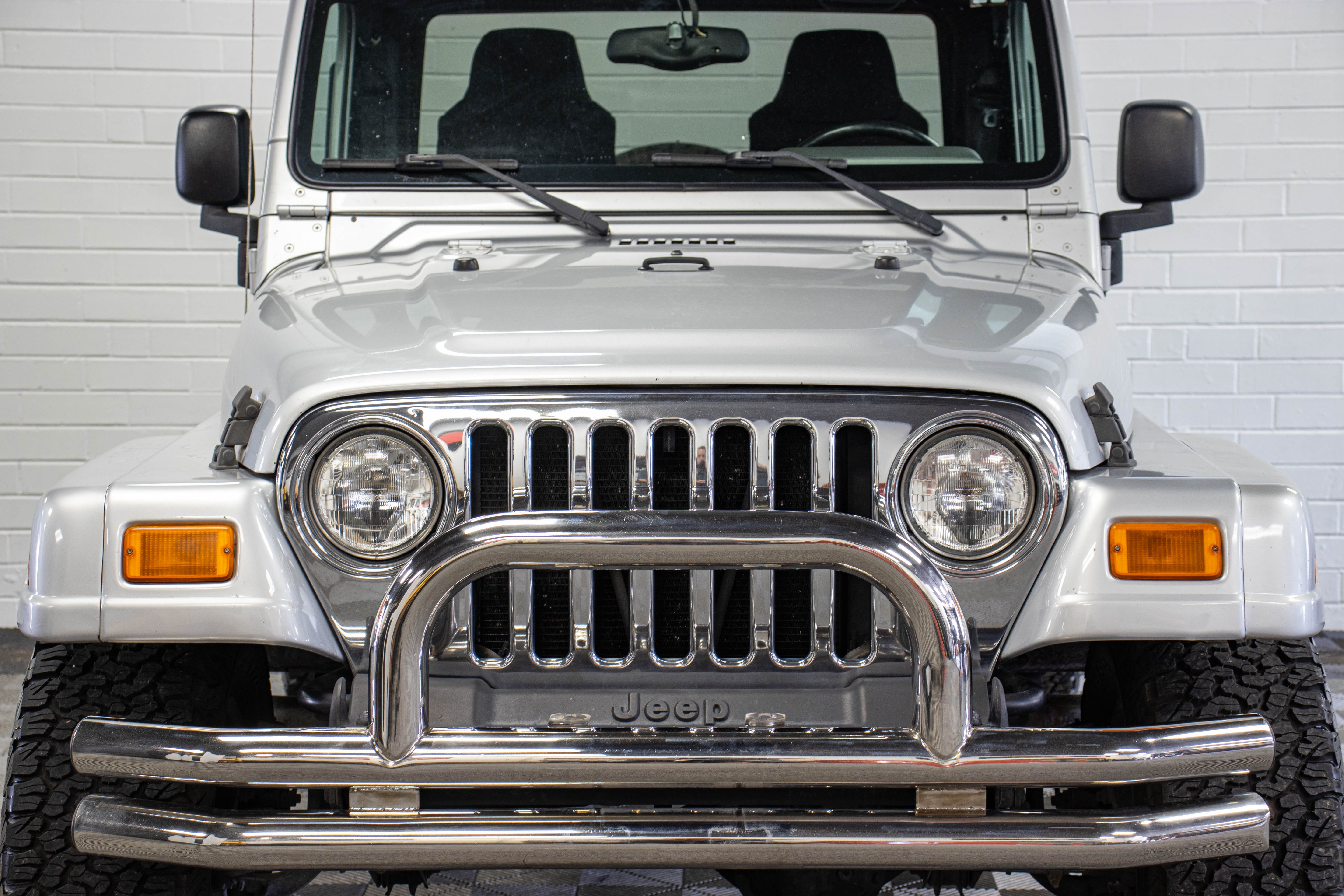 Pre-Owned 2006 Jeep Wrangler TJ Unlimited RubiTrux Conversion Bright Silver - SOLD
