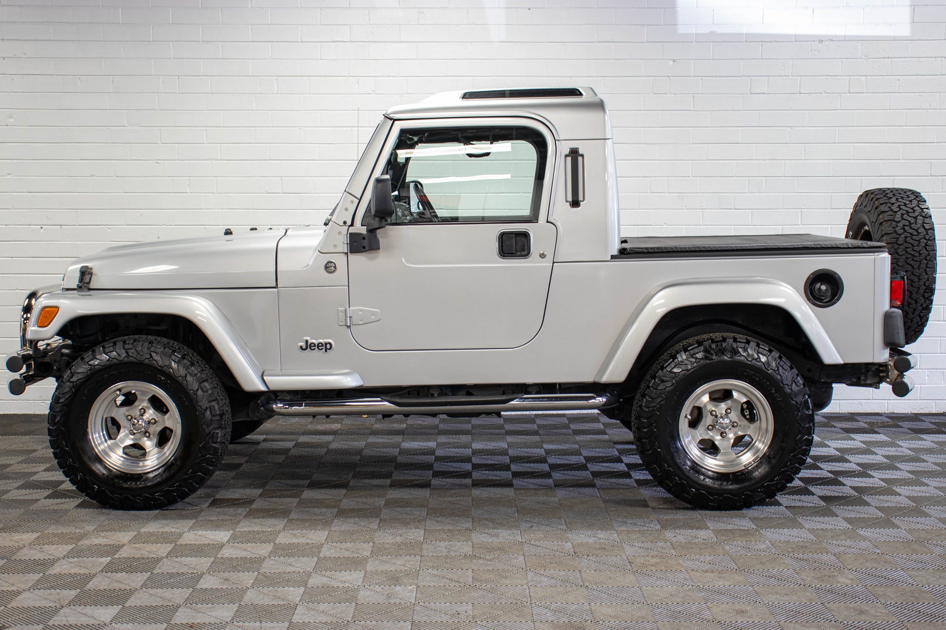 Pre-Owned 2006 Jeep Wrangler TJ Unlimited RubiTrux Conversion Bright Silver - SOLD