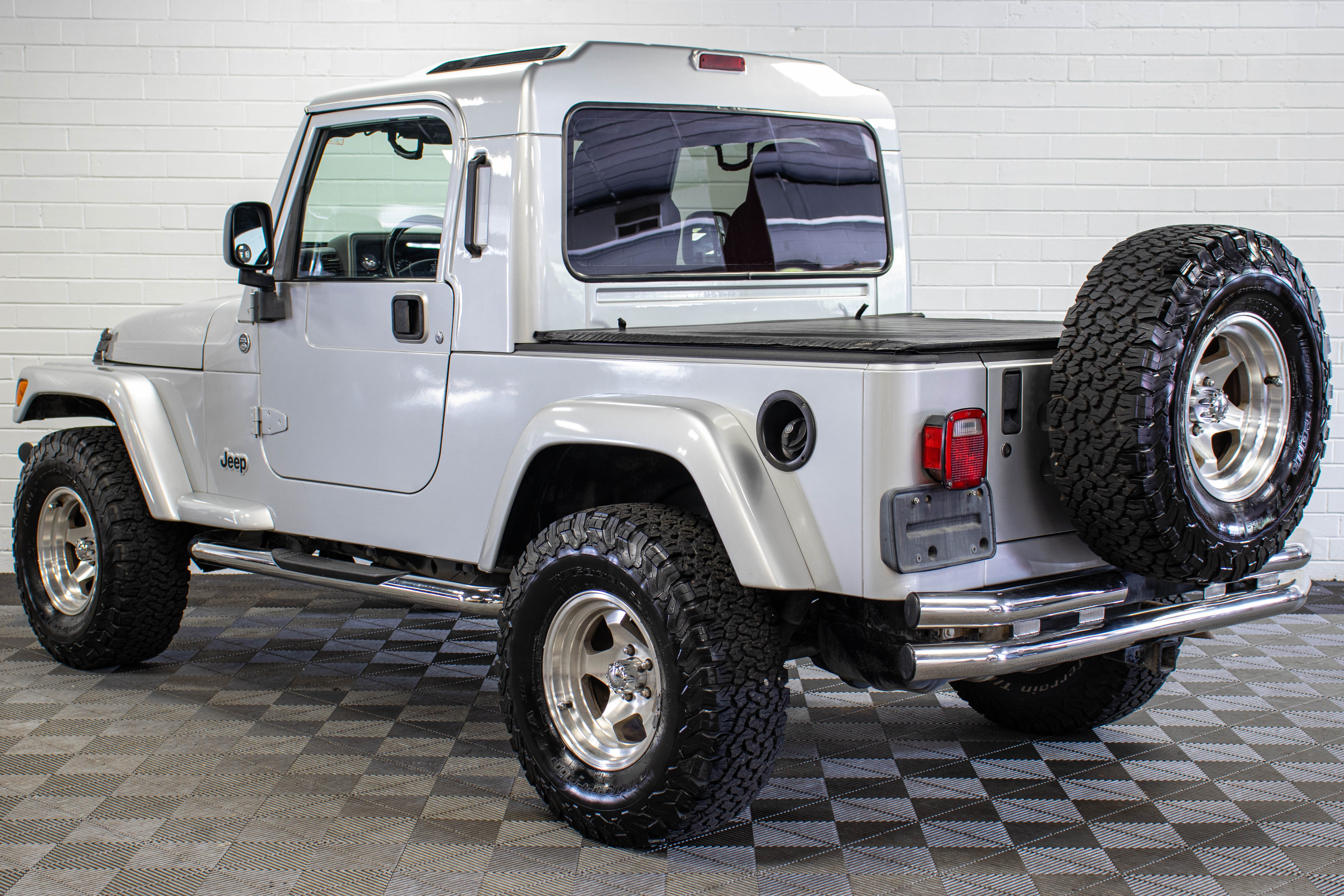 Pre-Owned 2006 Jeep Wrangler TJ Unlimited RubiTrux Conversion Bright Silver - SOLD