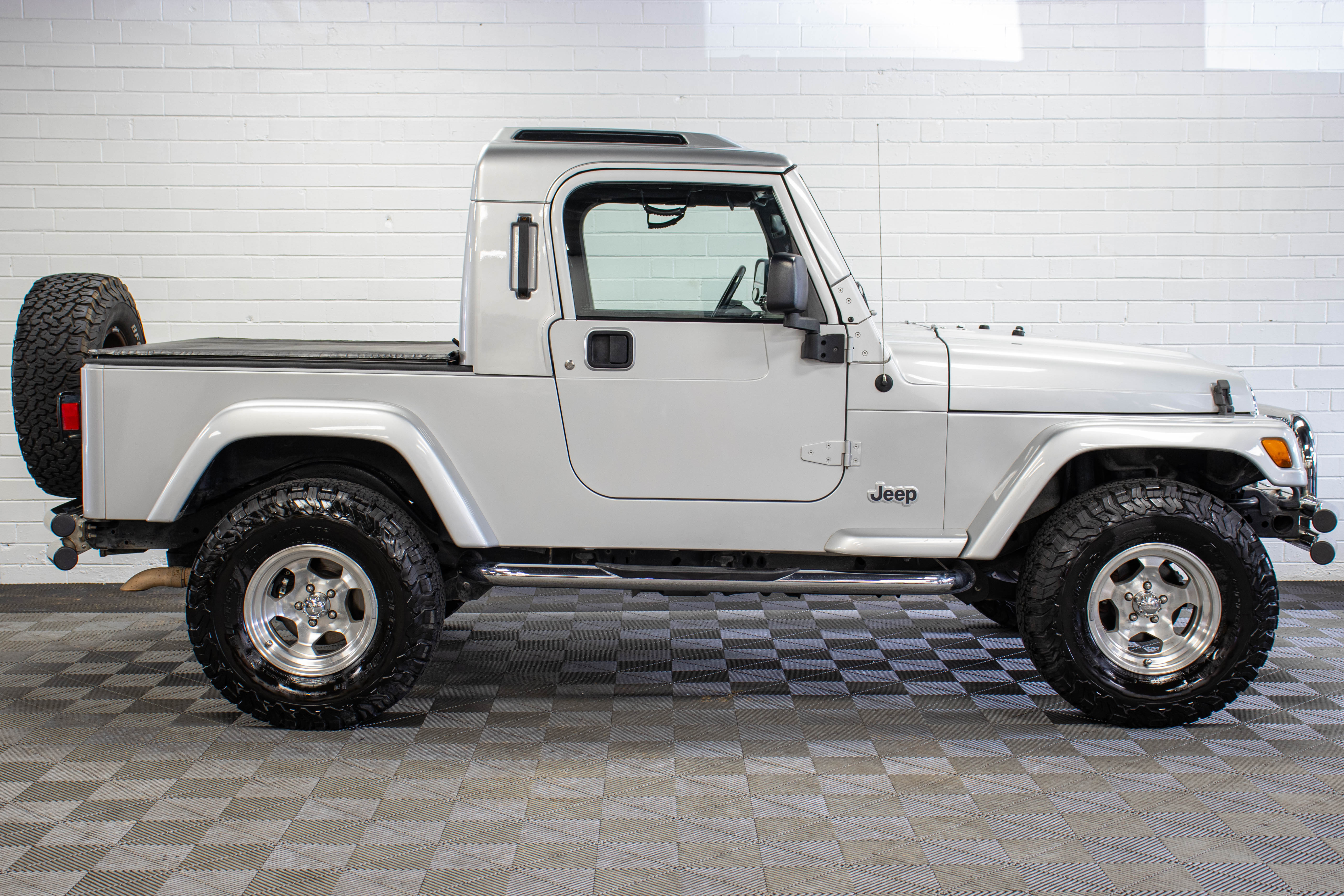 Pre-Owned 2006 Jeep Wrangler TJ Unlimited RubiTrux Conversion Bright Silver - SOLD