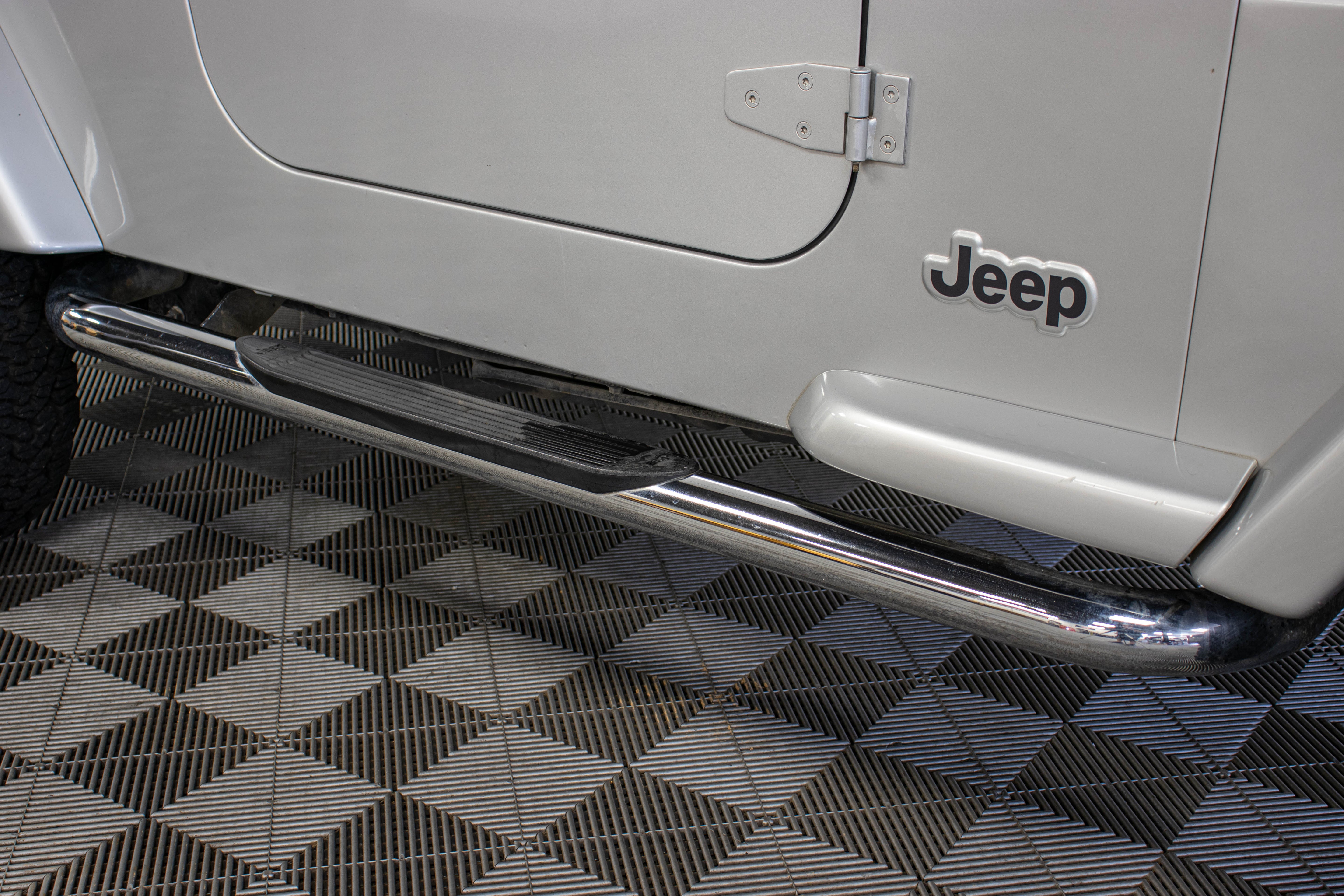 Pre-Owned 2006 Jeep Wrangler TJ Unlimited RubiTrux Conversion Bright Silver - SOLD