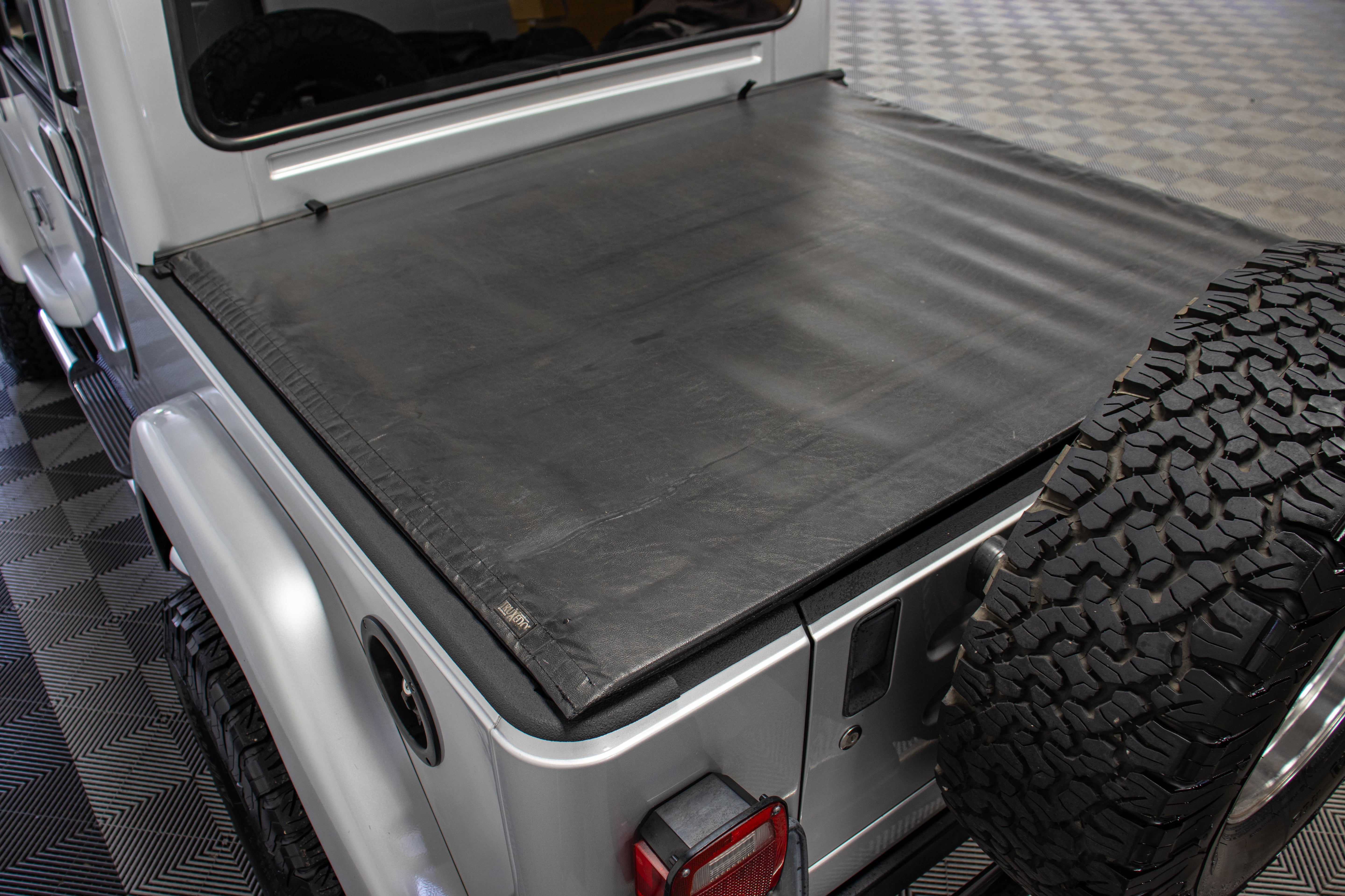 Pre-Owned 2006 Jeep Wrangler TJ Unlimited RubiTrux Conversion Bright Silver - SOLD