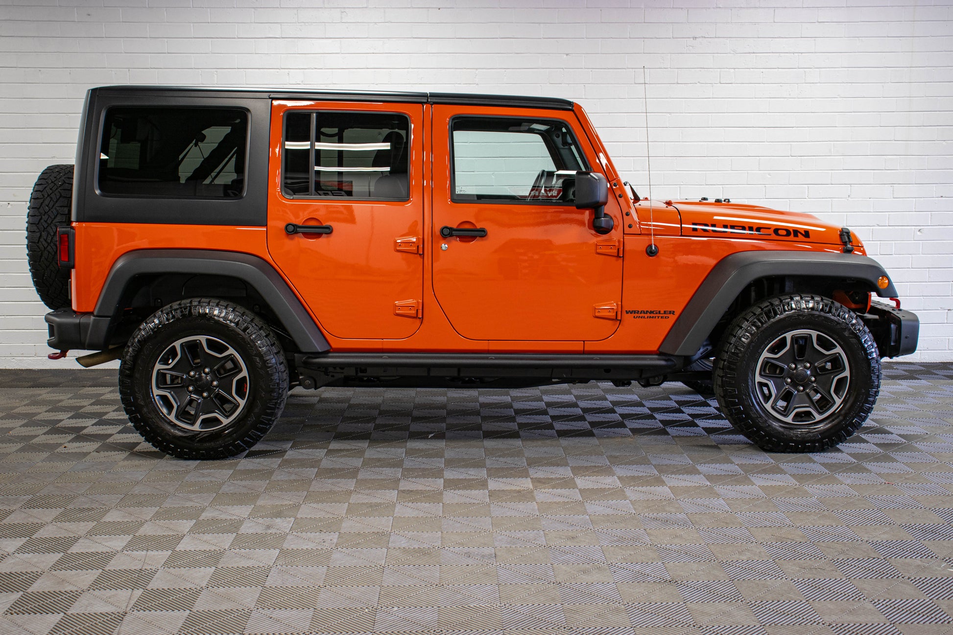 Pre-Owned 2015 Jeep Wrangler JK Unlimited Rubicon Hard Rock Hard Top Sunset Orange, 99k Miles