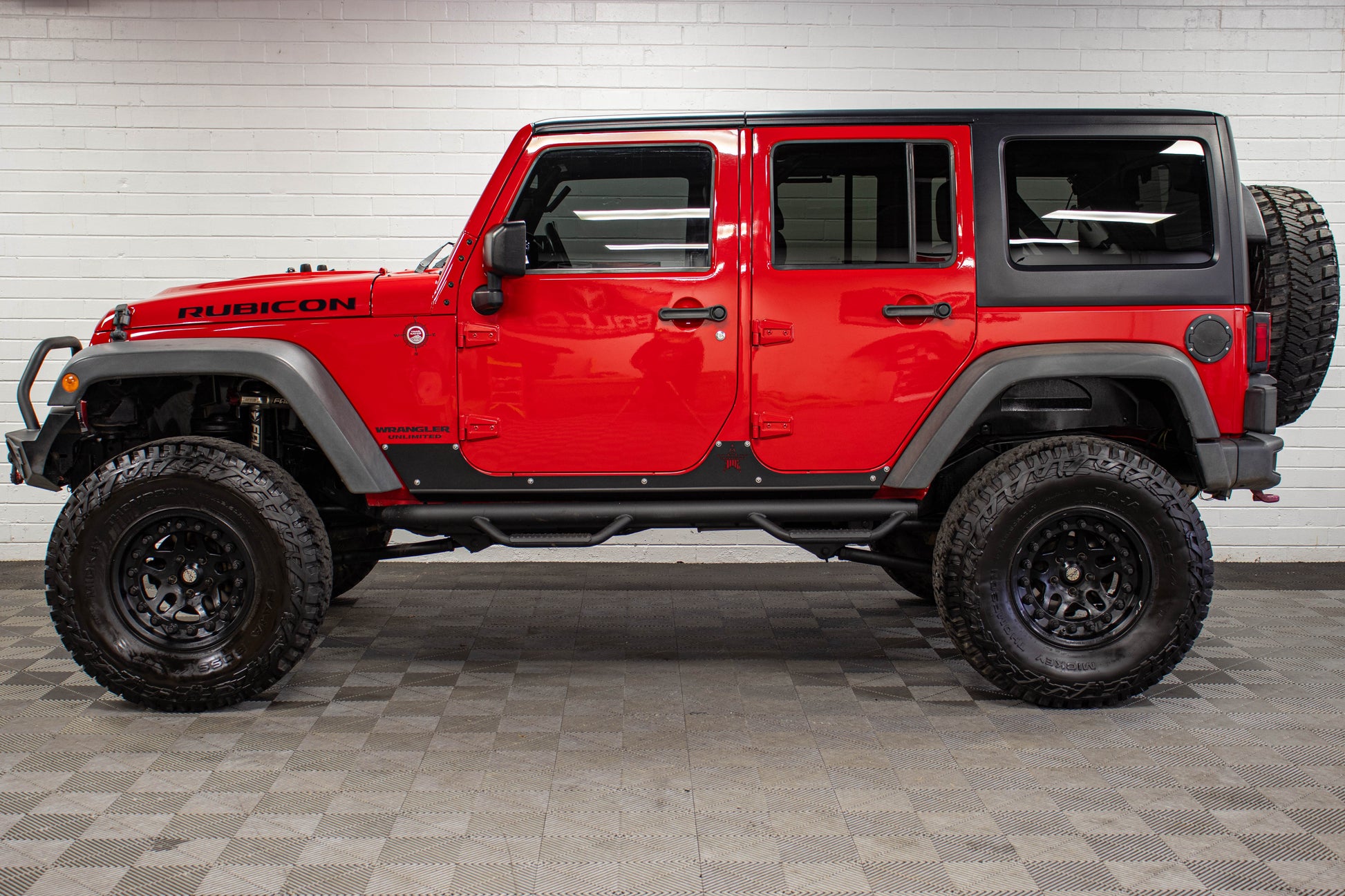 Pre-Owned 2015 Jeep Wrangler JK Unlimited Rubicon Hard Top Firecracker Red, 55k Miles