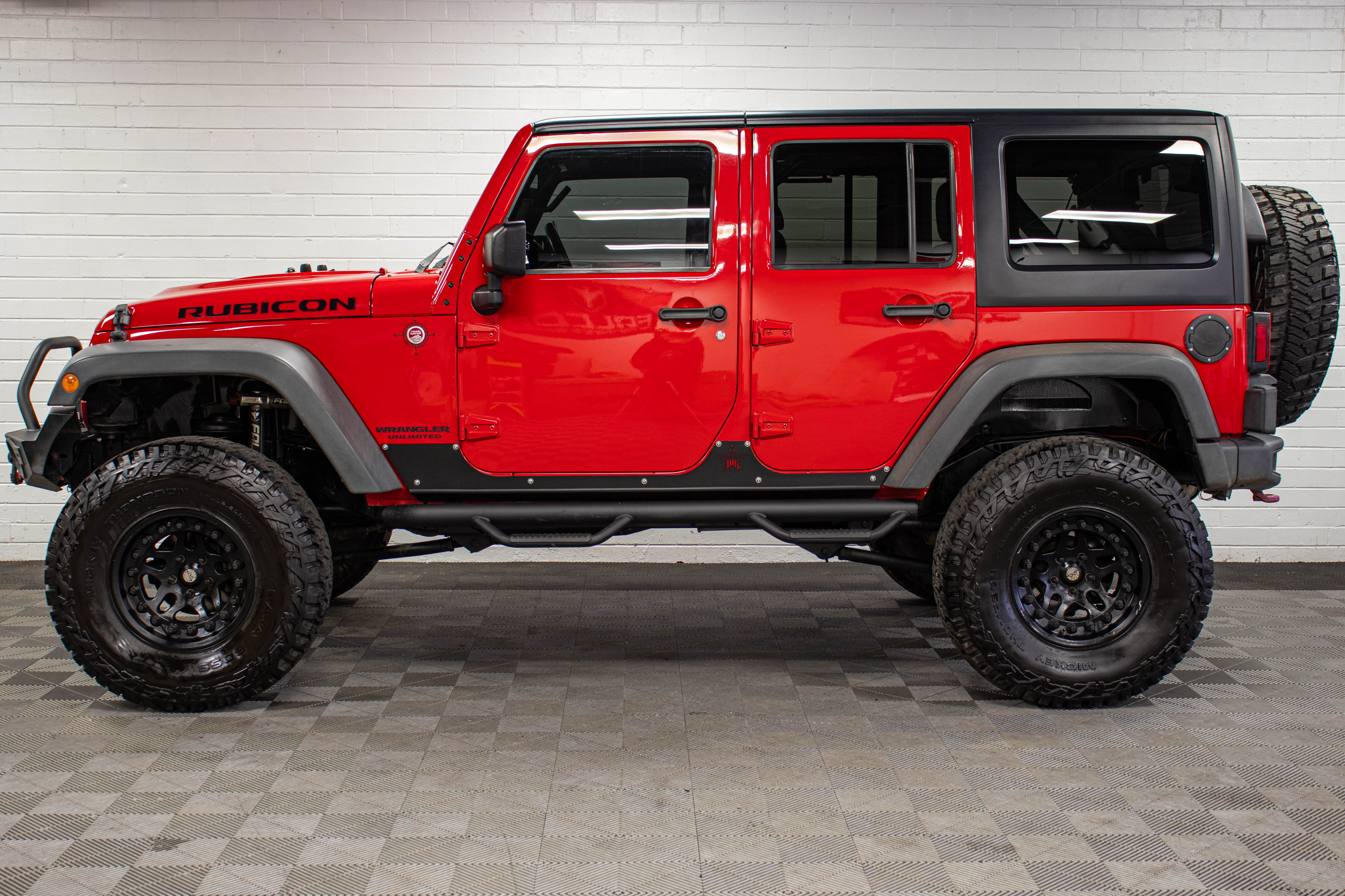 Pre-Owned 2015 Jeep Wrangler JK Unlimited Rubicon Hard Top Firecracker Red, 55k Miles