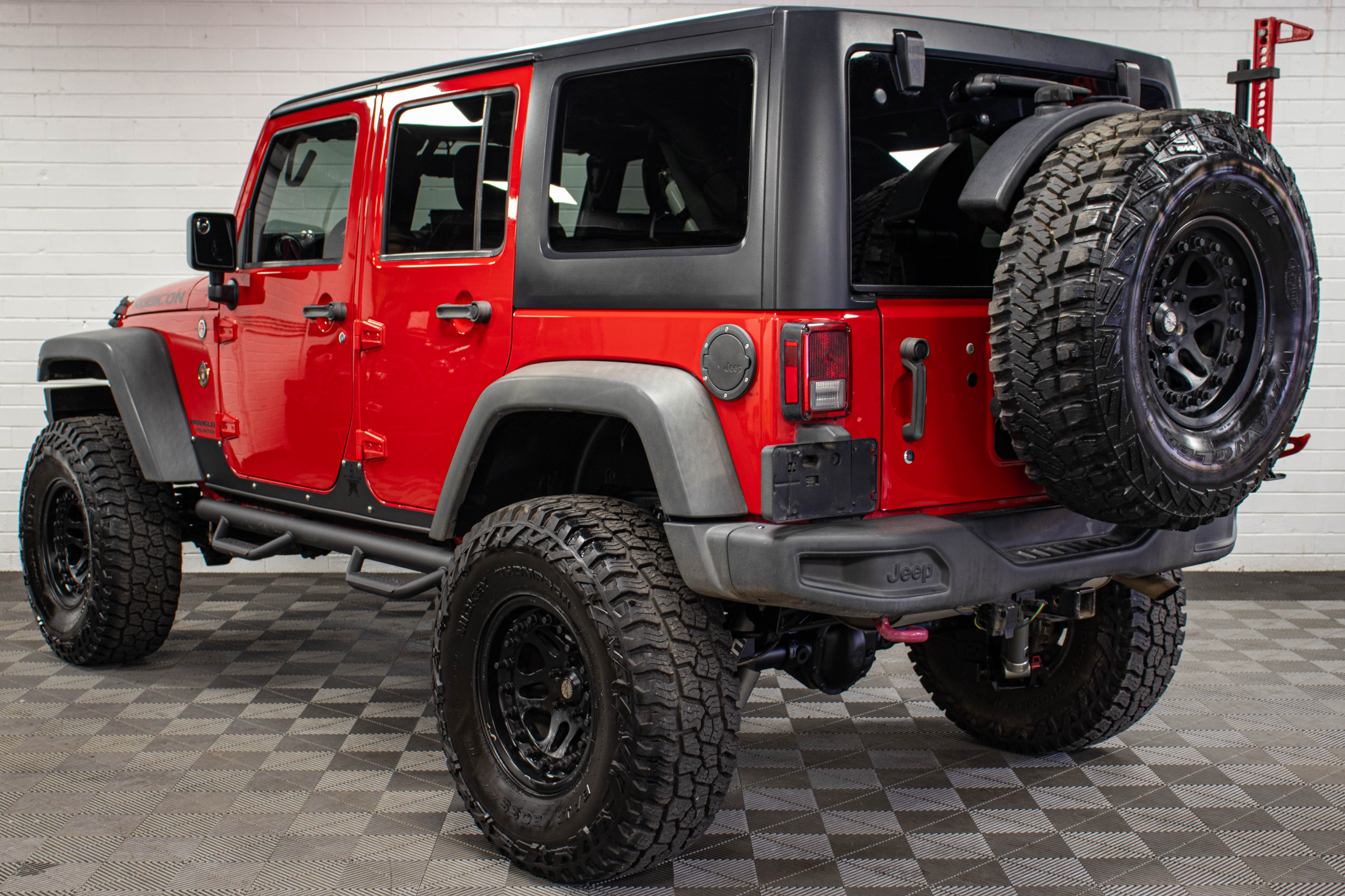 Pre-Owned 2015 Jeep Wrangler JK Unlimited Rubicon Hard Top Firecracker Red, 55k Miles