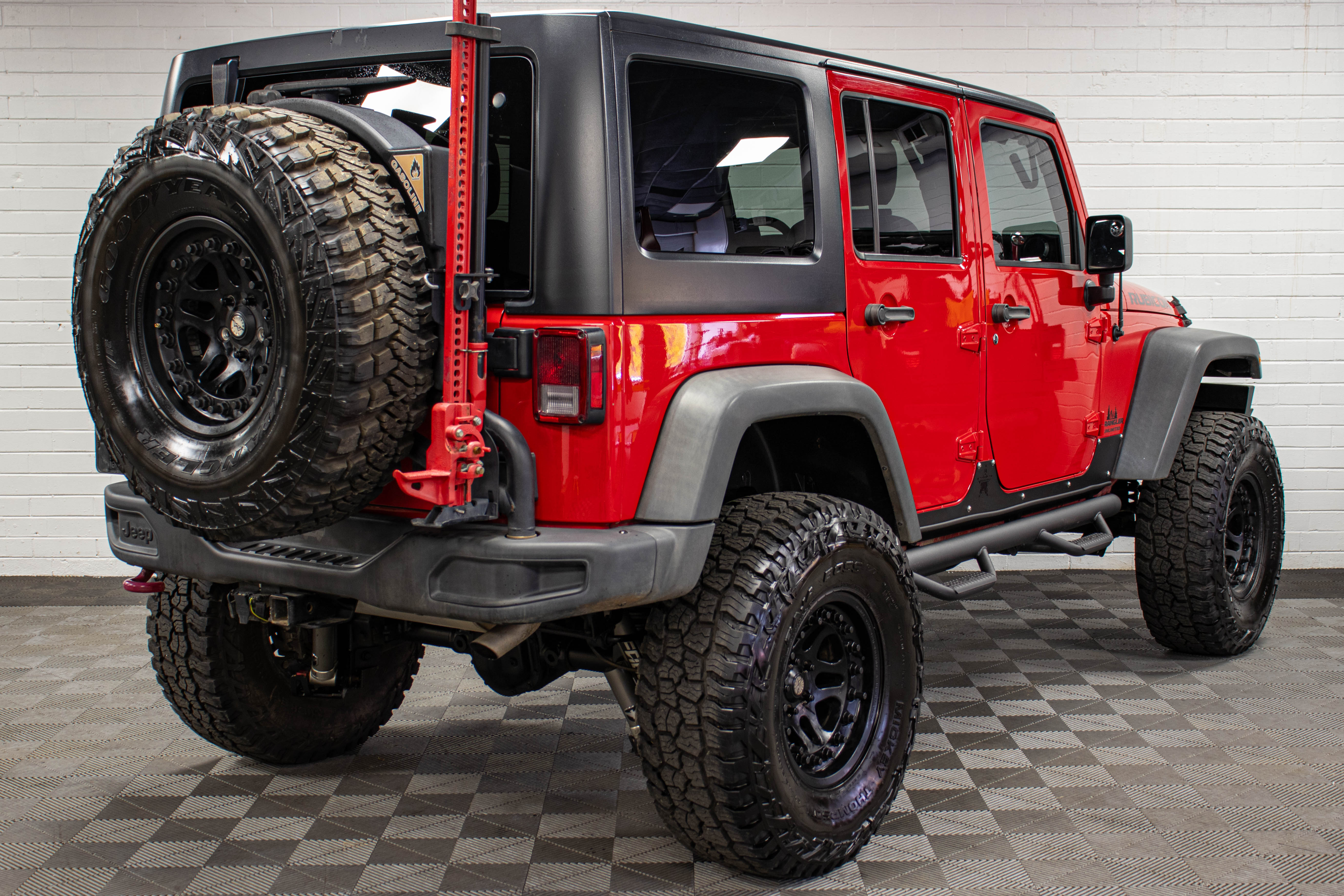 Pre-Owned 2015 Jeep Wrangler JK Unlimited Rubicon Hard Top Firecracker Red, 55k Miles