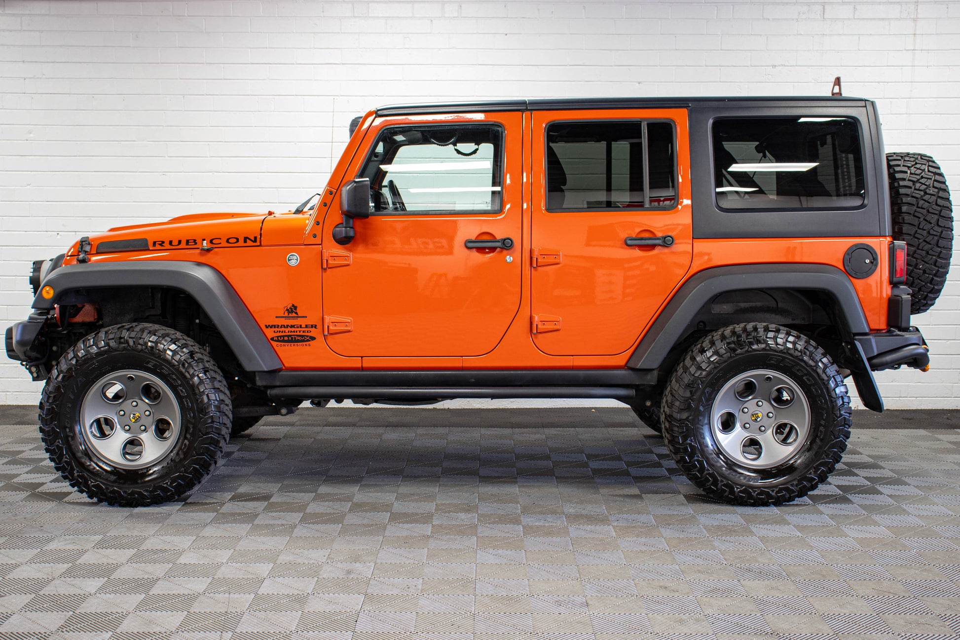 Pre-Owned 2015 Jeep Wrangler JK Unlimited Rubicon AEV JK350 Hard Top Sunset Orange, 53k Miles