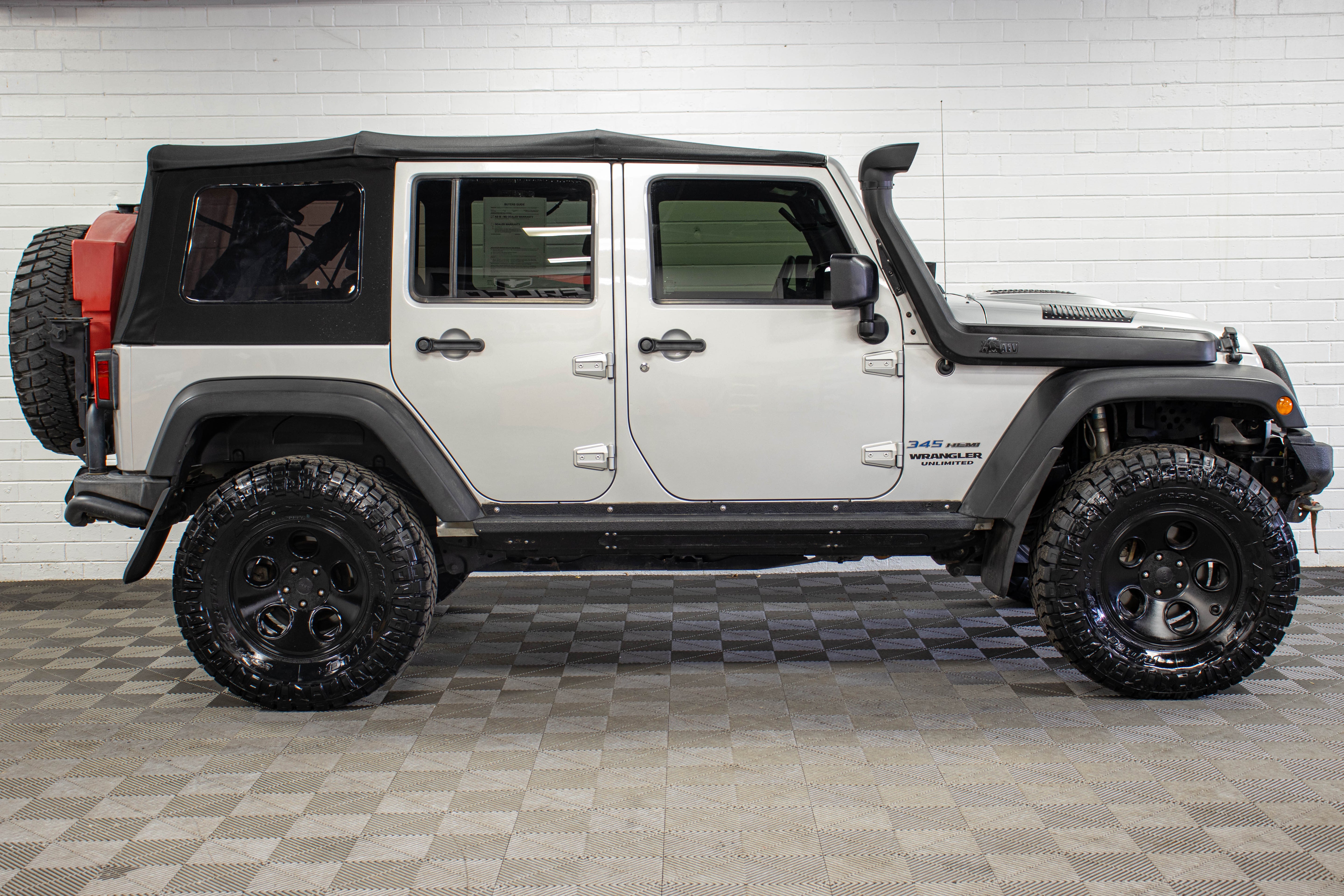 Pre-Owned 2011 Jeep Wrangler JK Unlimited Rubicon HEMI Soft Top Bright Silver, 114k Miles