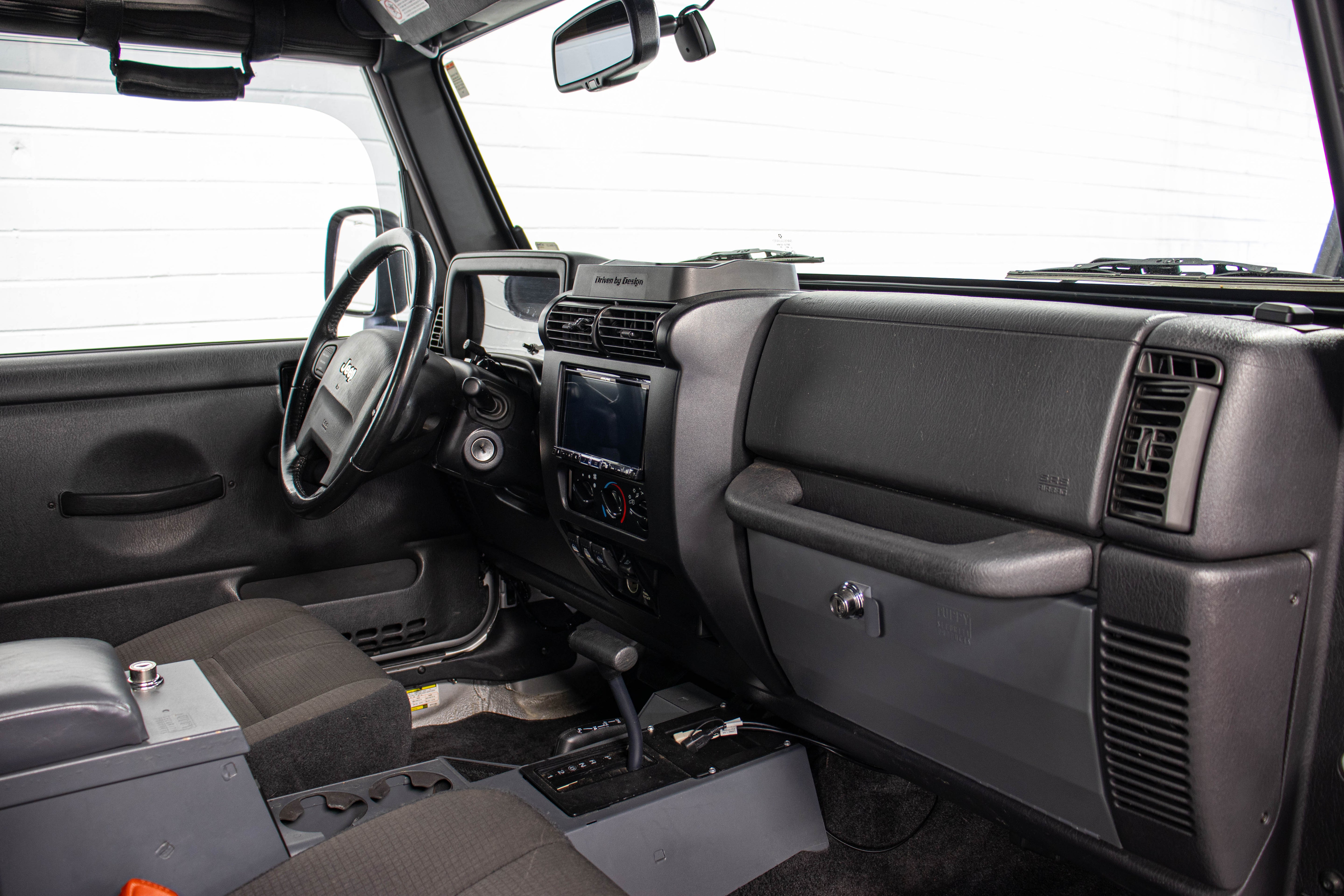 2006 Jeep Wrangler Unlimited RubiTrux Conversion Bright Silver, 28k Miles