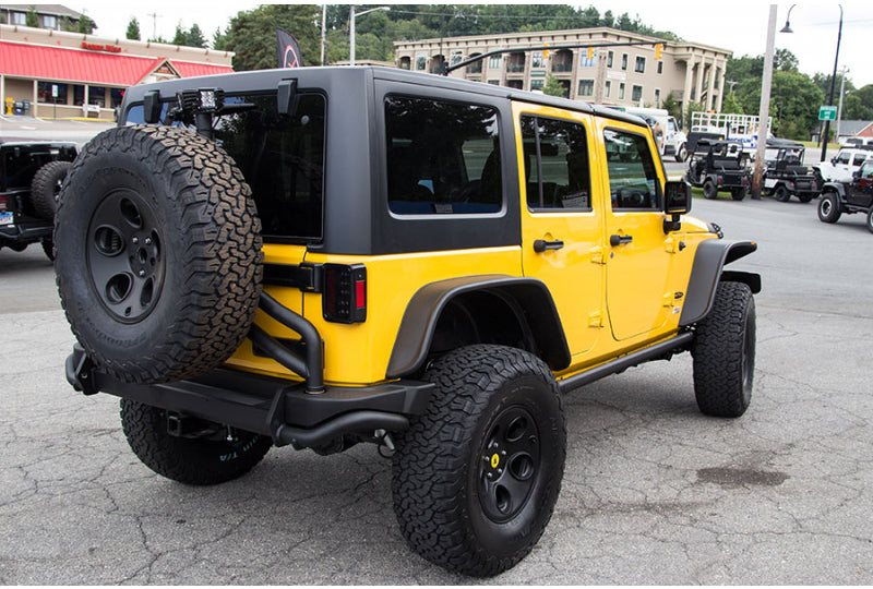 Custom 2015 Jeep Wrangler Unlimited Rubicon - Baja Yellow - AEV Rear Bumper and Tire Carrier