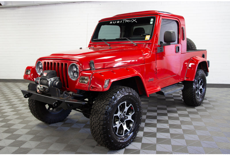 Pre-Owned 2004 Jeep Wrangler Unlimited RubiTrux Conversion Flame Red - SOLD