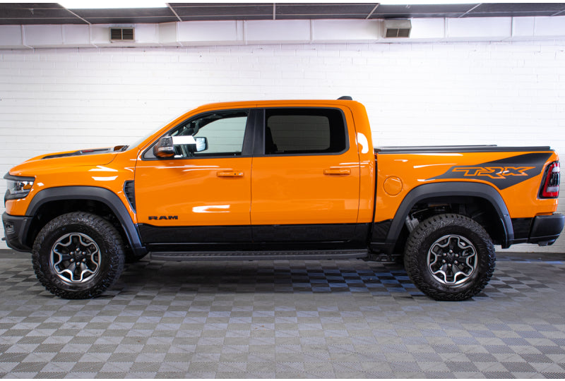 pre-owned 2022 ram 1500 trx 6.2L hemi supercharged driver side