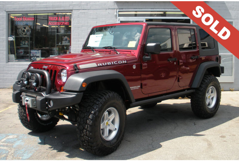 2009 Red Jeep Wrangler Unlimited - SOLD