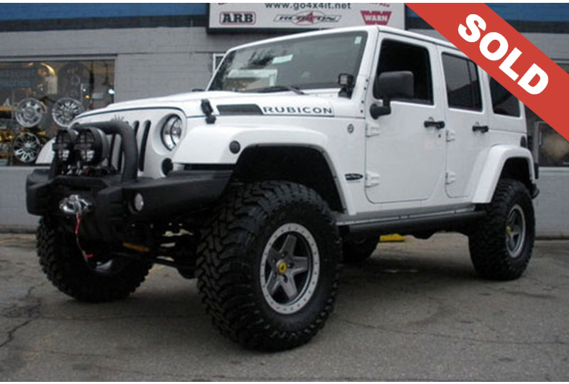 2013 White Jeep Wrangler Unlimited Rubicon - SOLD