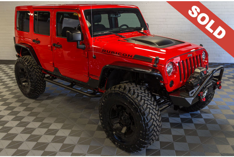 2015 Wrangler Rubicon Unlimited Poison Spyder - SOLD