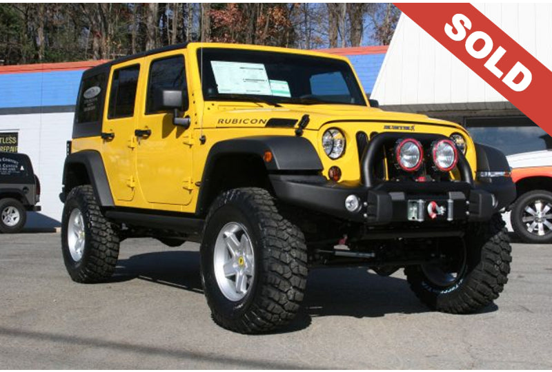 2011 Yellow Jeep Wrangler JK Rubicon Unlimited - SOLD